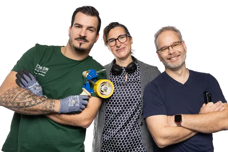 3 Eichler employees stand next to each other, shoulder to shoulder